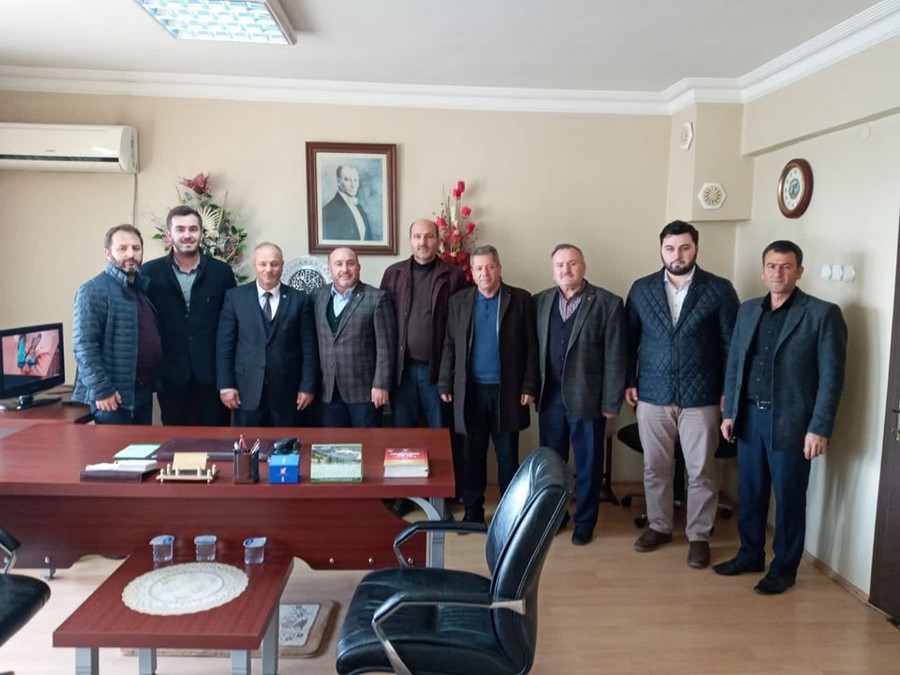 AK Parti İlçe Başkanı Çetin Seymen ve Yönetiminden  İSLAM ŞİŞMAN’A ZİYARET